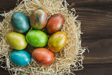 Easter eggs on wooden background