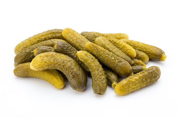 Marinated pickled cucumbers isolated on the white.