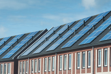 Fototapeta premium Green energy, a new housing development with every house fitted with solar panels
