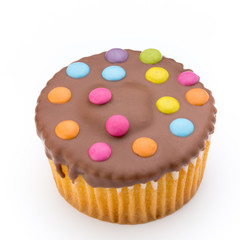 Multiple colorful decorated muffins on a white background.