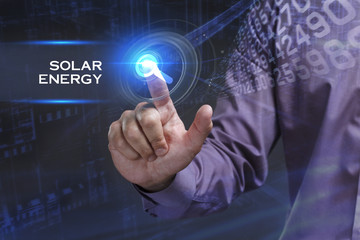 Business, Technology, Internet and network concept. Young businessman working on a virtual screen of the future and sees the inscription: Solar energy