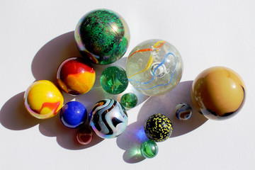 Colorful marbles balls on white background