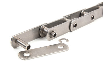 Technology of mechanical engineering. Part of industrial chain drive. Stainless steel chain.