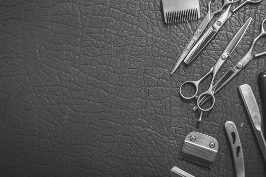 Vintage Barber Shop Tools On Skin Background With Place For Text