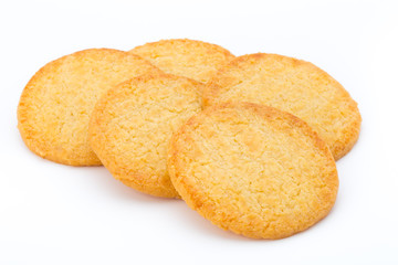 Stacked short pastry cookies isolated on white background.