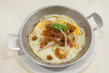 Pan fried egg with topping Vietnamese style