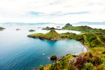 Padar Island, Komodo National Park in East Nusa Tenggara, Indonesia. Amazing marine seascape with mountains and rocks