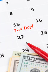 Tax day on calendar with red marker pen