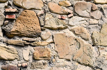 The texture of old stones together with cement.