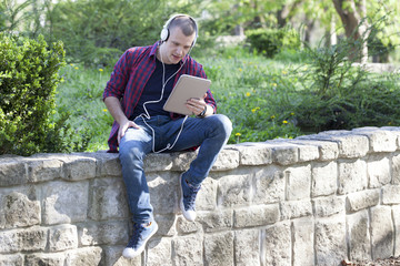 Portrait of a young man outdoors