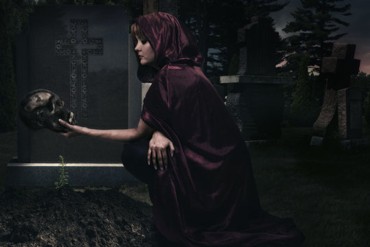 Beautiful Sorceress In Creepy Cemetary. Fantasy Concept.