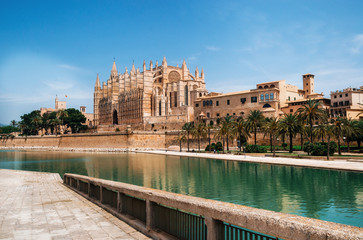 Park de la Mar against La Seu, the gothic medieval cathedral of Palma de Mallorca, Spain. The...