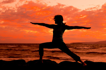 Fototapeta na wymiar Yoga on a Maui Beach at Sunset