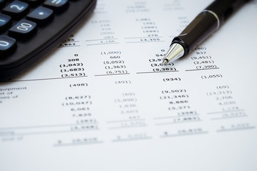 Business background, financial data and accounting report concept with pen