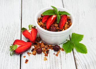 Homemade granola with strawberries