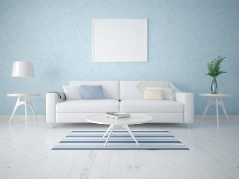 Mock up a modern living room with a compact sofa on a background of blue wallpapers.
