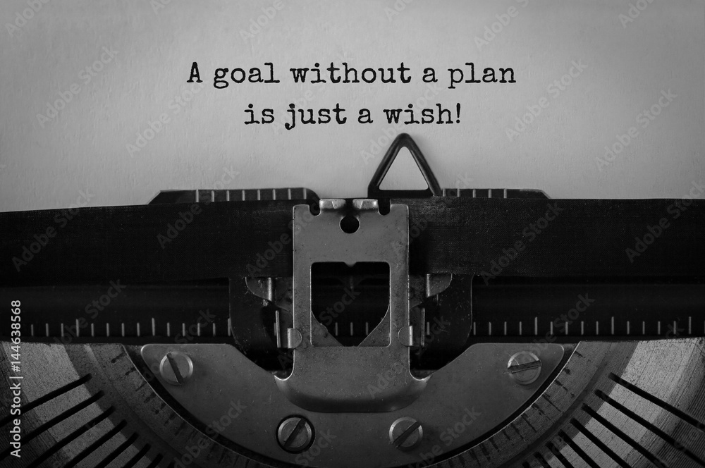 Wall mural text a goal without a plan is just a wish typed on retro typewriter