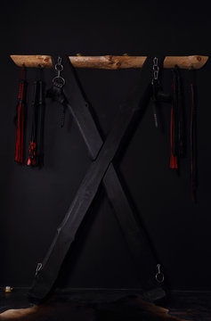 Wooden sexual bondage cross