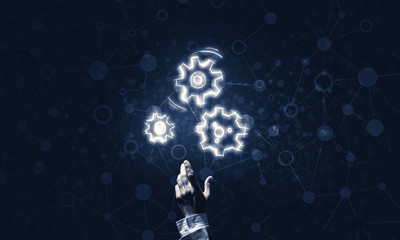 Glowing cogwheel mechanism icon on dark background as symbol of 