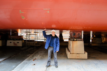 Man in ship repair