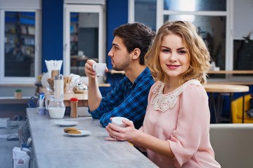 couple drinking coffee in the cafe
