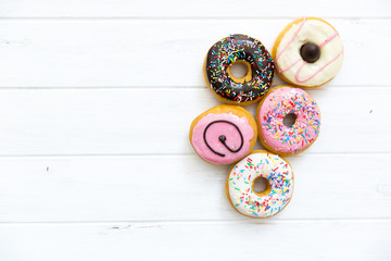 Fresh donuts on white background.