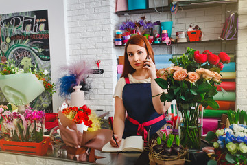 young girl working in a flower shop