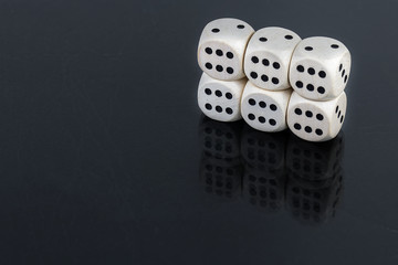 Dice six horizontal sixes on a black background