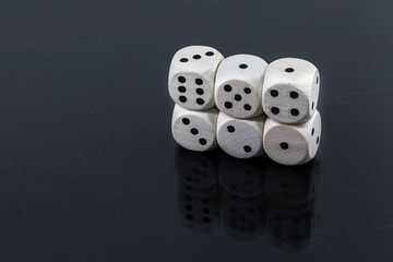 Dice straight: one, two, three, four, five on a black background