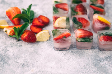 Fresh homemade ice cubes with fruits. Summer fresh drink