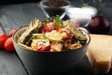 Whole Wheat Pasta Salad with Fresh Arugula, Mozzarella, Roasted Red Bell Peppers and Pesto Sauce