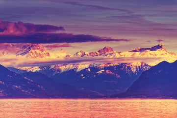 Fototapeta na wymiar Pink sunset over Alps and Lake Geneva, Switzerland
