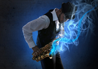 Naklejka premium Elegant saxophonist plays jazz on dark background