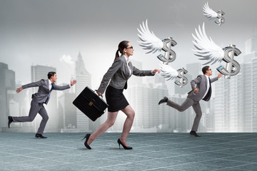 Businesspeople chasing angel investor funding