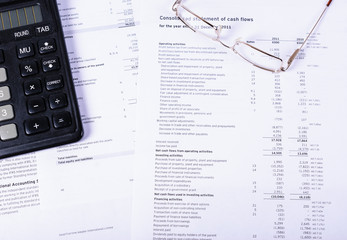 Business still - life-documents, glasses and calculator