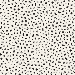 Scattered Geometric Shapes. Inspired by Memphis Style. Abstract Background Design. Vector Seamless Black and White Irregular Pattern.