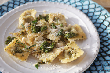 Plates with delicious ravioli, closeup