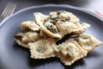 Plate with delicious ravioli, closeup