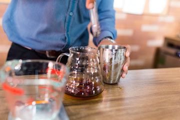 Barista making hand drip coffee