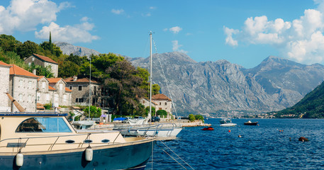 Fototapeta na wymiar Sailboat in the ancient town of Perast in Bay of Kotor, Montenegro