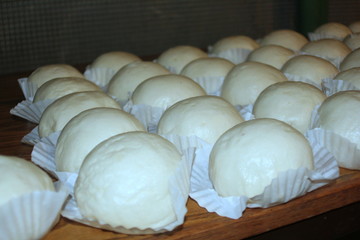 Siopao (steamed buns) Siopao, or steamed buns is a famous snack sold mostly in China and the Philippines. It can have varied fillings like chicken, pork, beef, or sweets.