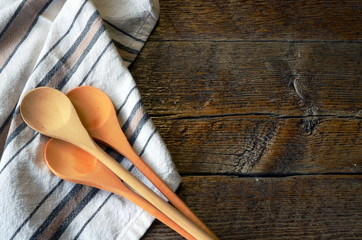 Wooden Mixing Spoons and Dish Towel