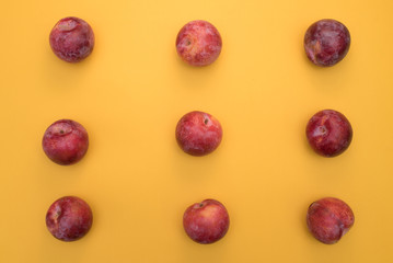 Peaches on a yellow background