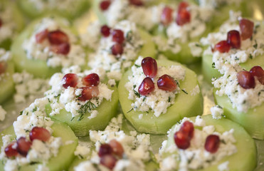 Cucumber Pomegranate and feta canapés with Dill