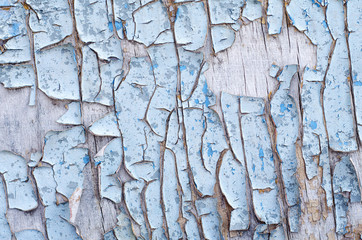 background old cracked paint on a wooden surface