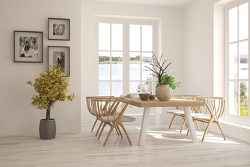White dinner room with green landscape in window. Scandinavian interior design. 3D illustration