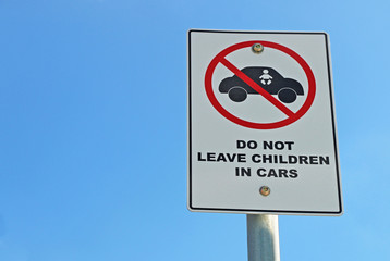 red, black and white Do Not Leave Children In Cars sign