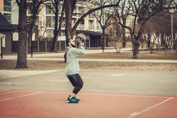 Fototapeta premium African-american streetball player practicing outdoors