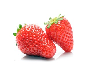 Two strawberries isolated on white background