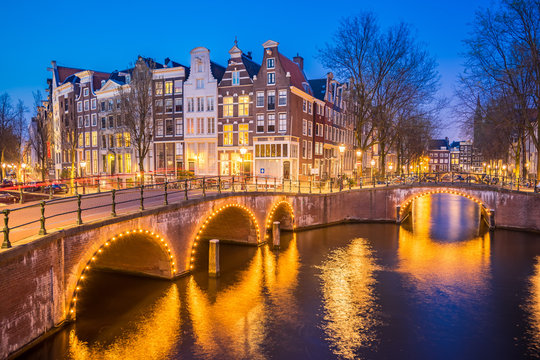 Night view of Amsterdam city skyline at night in Netherlands